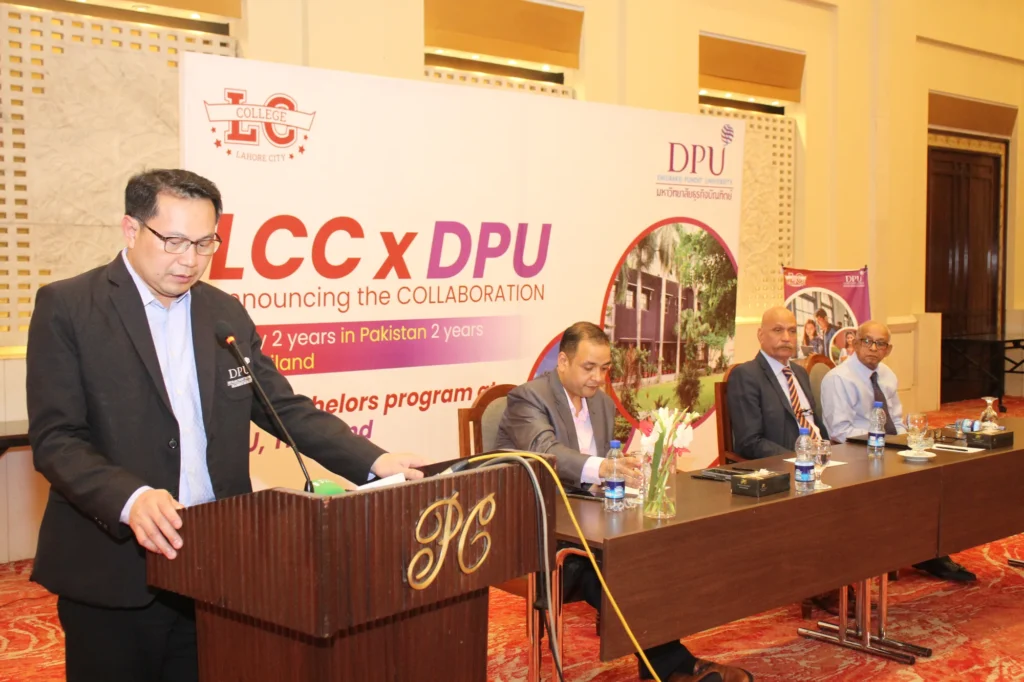 DPU Thailand delegate addressing guests in Lahore